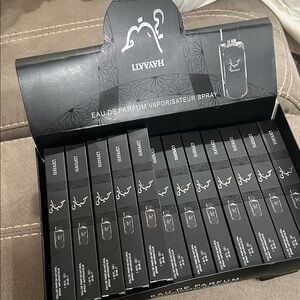 Lattafa Eau De Parfum Spray on base